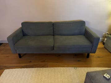 Comfortabele grijze 2,5 zits bank