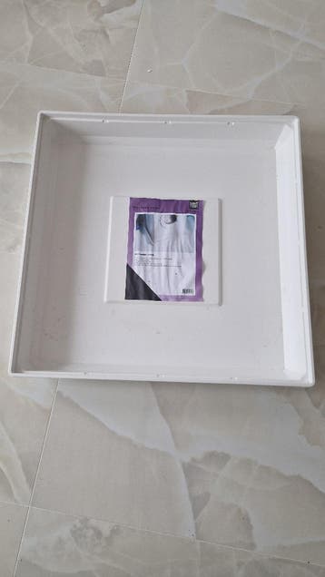 Wasmachine lekbak