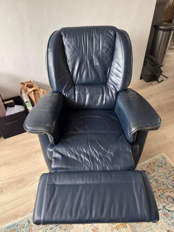 Gratis Comfortabele blauwe leren relaxfauteuil