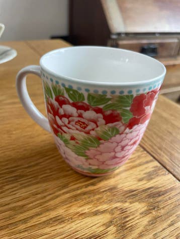 Mok met bloemenprint - Zo goed als nieuw
