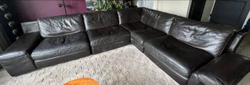 Gratis Comfortabele donkerbruine leren hoekbank