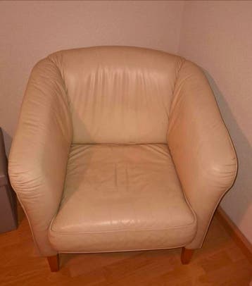 Gratis Creme kleurige leren fauteuil / stoel