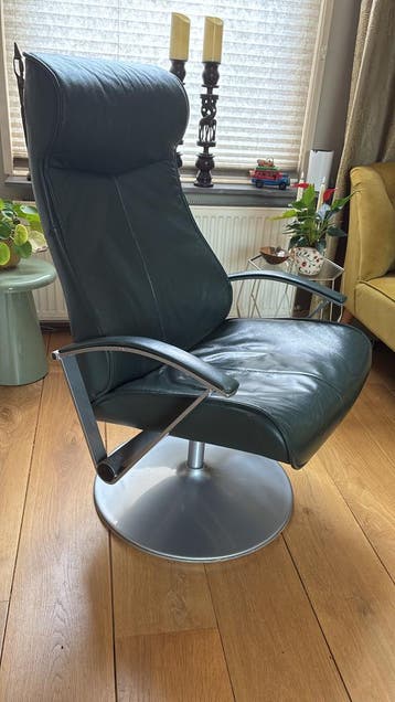 Kantelbare relaxfauteuil van donkergroen leer