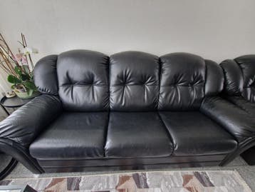 Zwarte leren bankstel (3-zits, 2-zits en fauteuil)