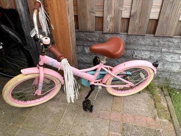 Roze kinderfiets 16 inch met zijwieltjes