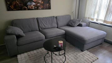 Comfortabele grijze hoekbank met chaise longue