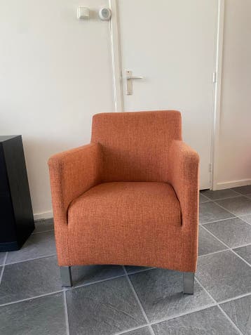 Vier oranje fauteuils - Comfortabel en stijlvol