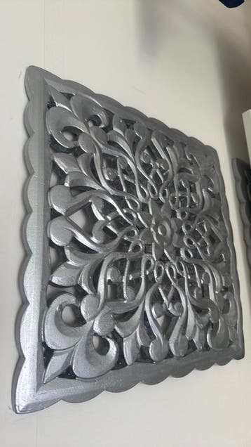 Gratis 2x wanddecoratie zilverkleurig