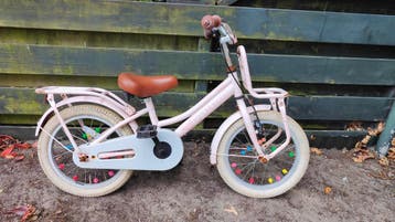 Gratis roze kinderfiets 16in