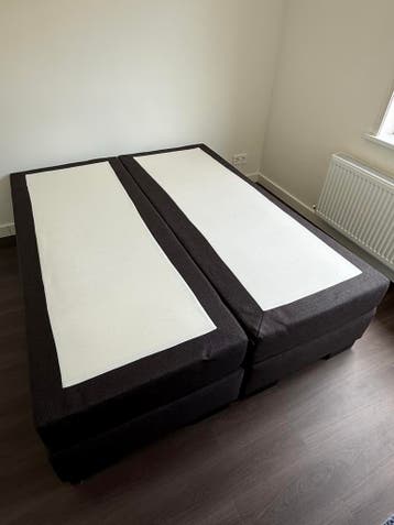 Gratis: Boxspring inclusief matras en topper