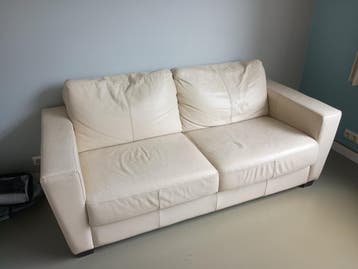 Comfortabele crèmekleurige leren tweezitsbank