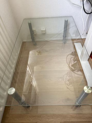 Glazen salontafel met wieltjes