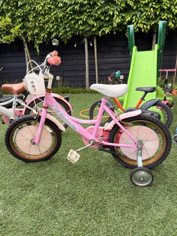 Gratis Roze kinderfiets met zijwieltjes - Lil' Blossom
