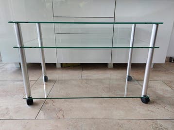 Glazen tafeltje met wieltjes - 85x40x52 cm