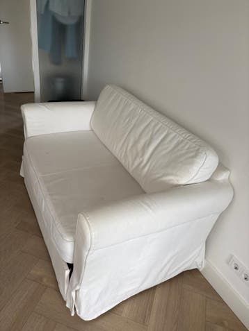 Witte slaapbank met onderlade - Gebruikt maar goed
