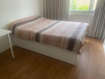 Gratis wit bedframe met opberglades