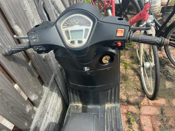 La souris designo scooter