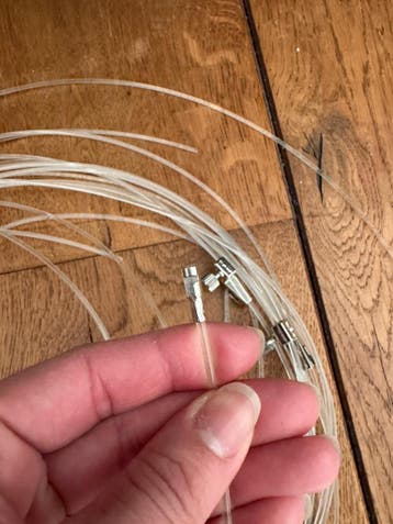 Nylon thread for hanging picture frames on the wall.