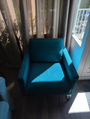 Blauwe fauteuil in goede staat