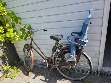 Fiets met kinderzitje, lekke achterband, gratis op te halen.
