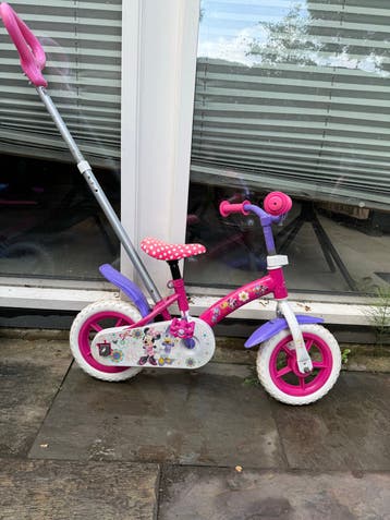 Leuke roze kinderfiets met duwstang - Minnie Mouse