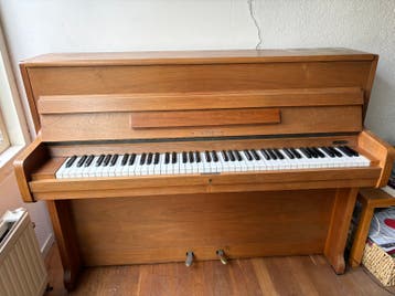 Rippen piano met kruk