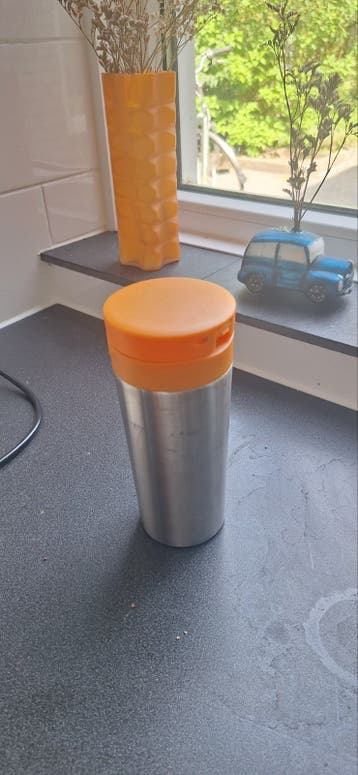 Roestvrijstalen thermoskanreismok met oranje deksel - Koffie