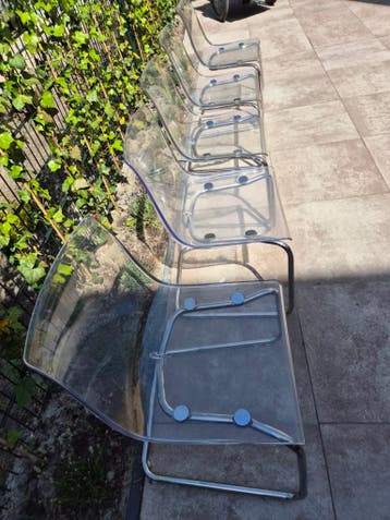 Set van 5 transparante stoelen GRATIS