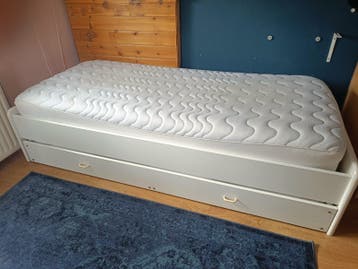 Gratis eenpersoonsbed met logeerbed lade