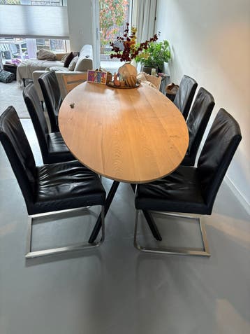 Set van 4 zwarte leren eetkamerstoelen