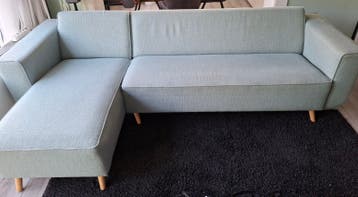 hoekbank met een longchair aan de linkerkant.