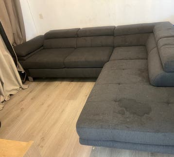 Hoekbank met slaapfunctie en opbergruimte