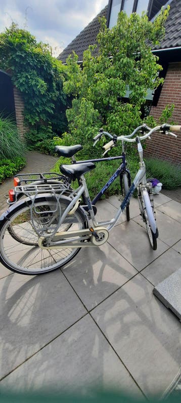 GRATIS, 1 dames -en 1 herenfiets