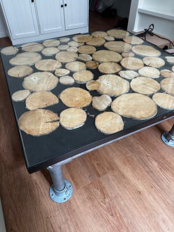 Industrial Coffee Table with Glass Top and Wood Design