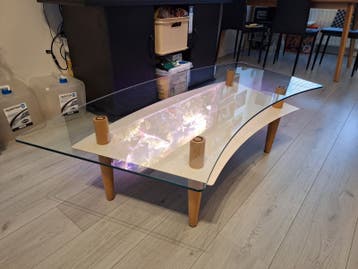 Gratis: Glazen salontafel met houten details - 140x60cm
