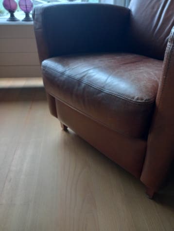2 Vintage leren fauteuils,  donkerbruin en cognac