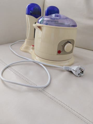 Waxapparaat met twee waxpatroonverwarmers