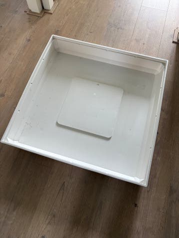 Wasmachine lekbak gratis