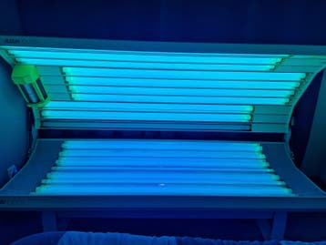 Gratis Dubbele zonnebank met ventilator en timer