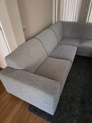Grijze hoekbank met chaise longue
