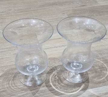 Gratis bij aankoop: 2 glazen vazen/windlichten