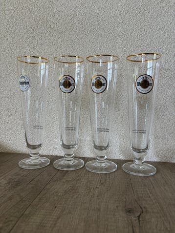 4 Warsteiner bierglazen.