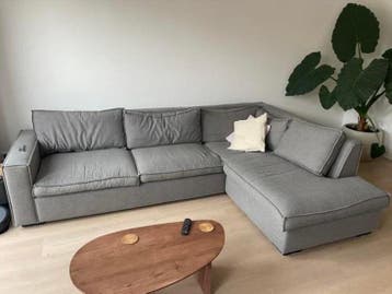 Grijze hoekbank met chaise longue