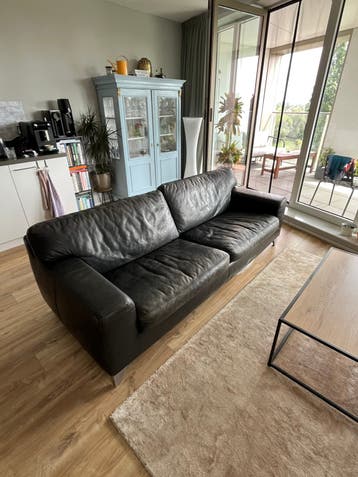 GRATIS Comfortabele zwarte leren bank - 3-zits
