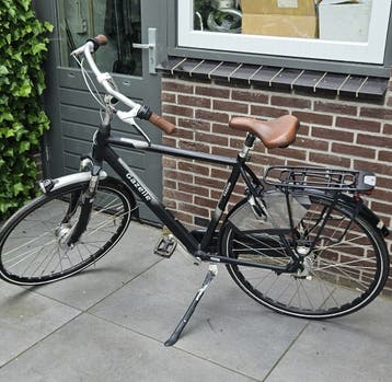 Gazelle zwarte herenfiets kapot