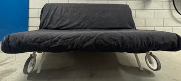 Old black sofa bed