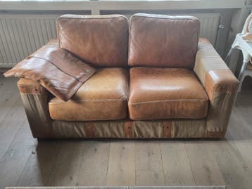 Comfortabelere drie en  tweepersoonsbank van leer en stof