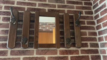 Gratis garderobe en spiegel