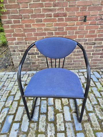 Blauwe gestoffeerde zitstoel