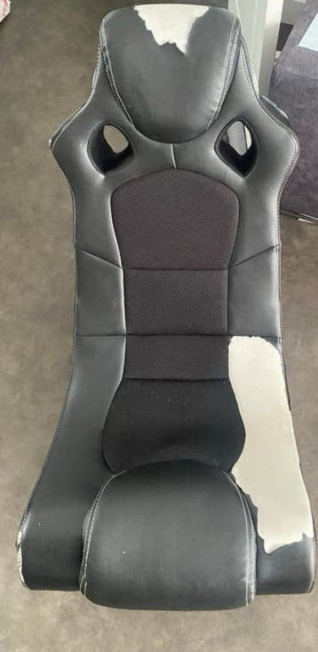 Gamestoel (beschadigde bekleding)